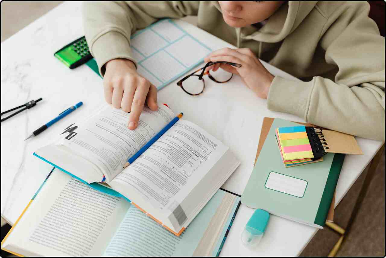 Girl focused on learning through reading and studying